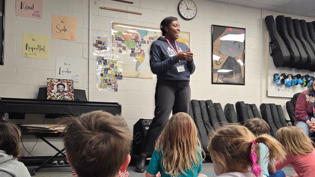 Leading students in a music lesson