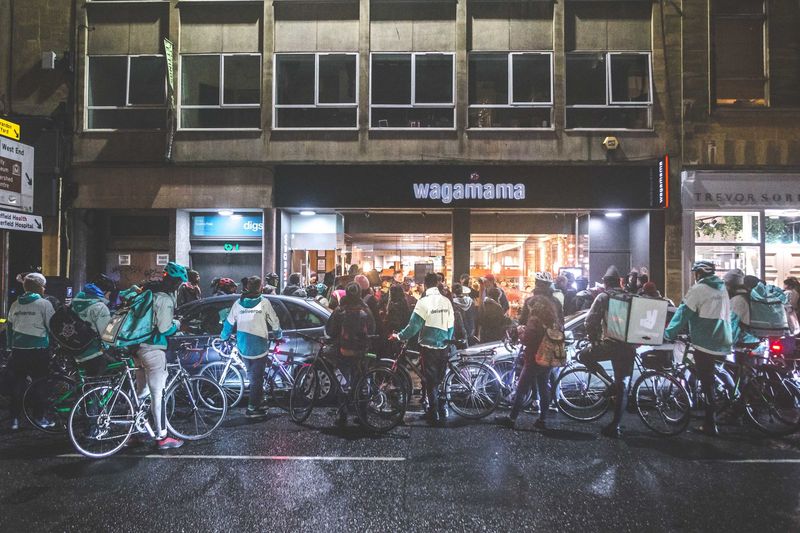 Around 50 cross-party MPs demand Deliveroo protect income and safety of its riders