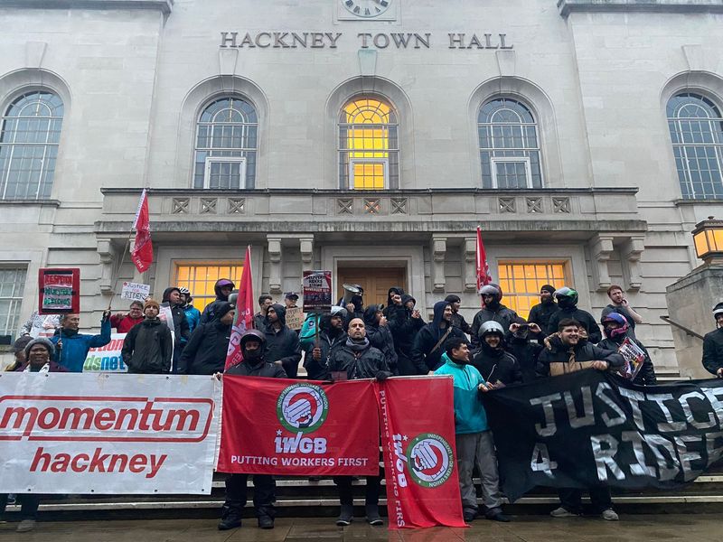 Striking food delivery couriers facing £130 fines while working rally at Hackney Town Hall to demand free and safe parking